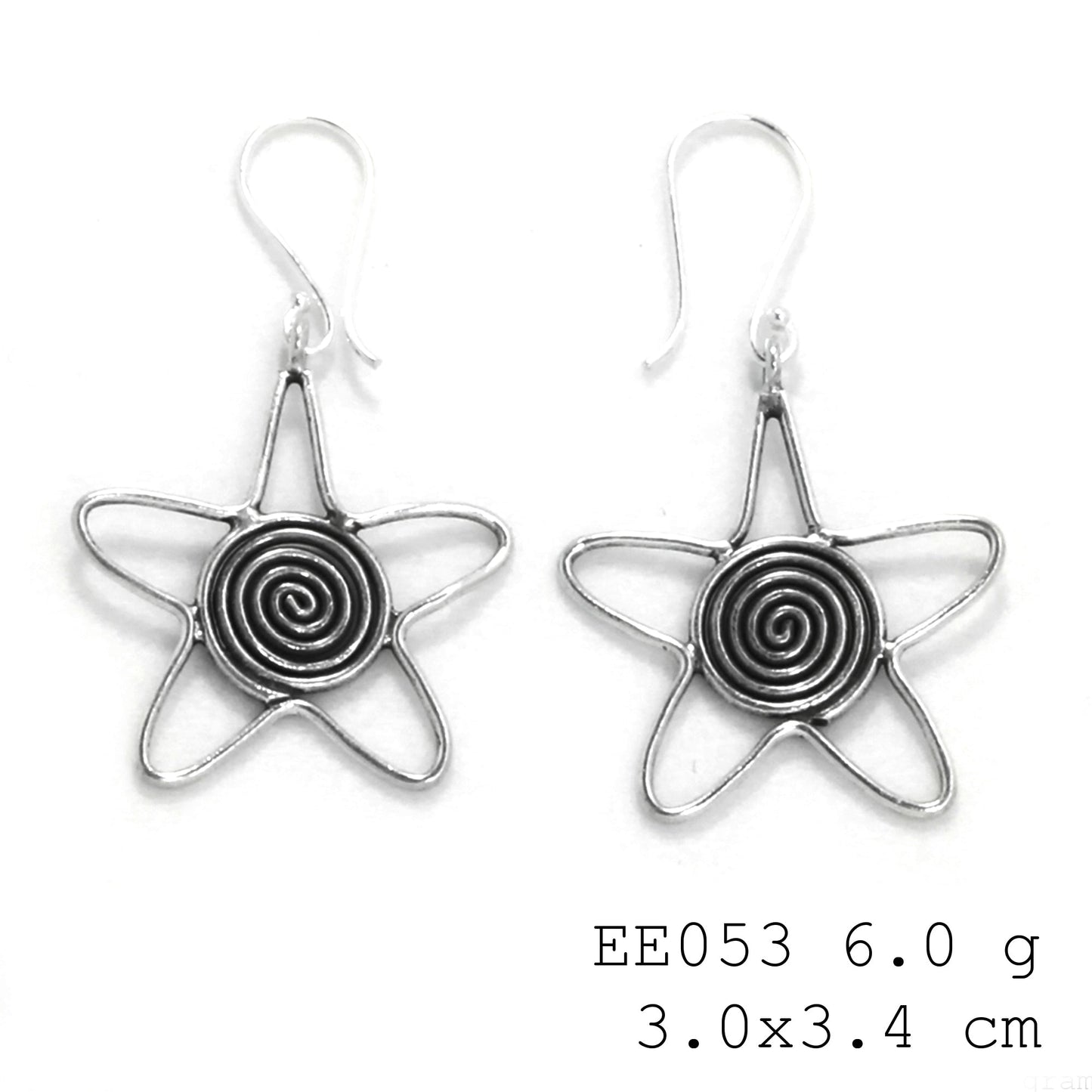 Get caught in the detail. Love these spiral silver earrings.
