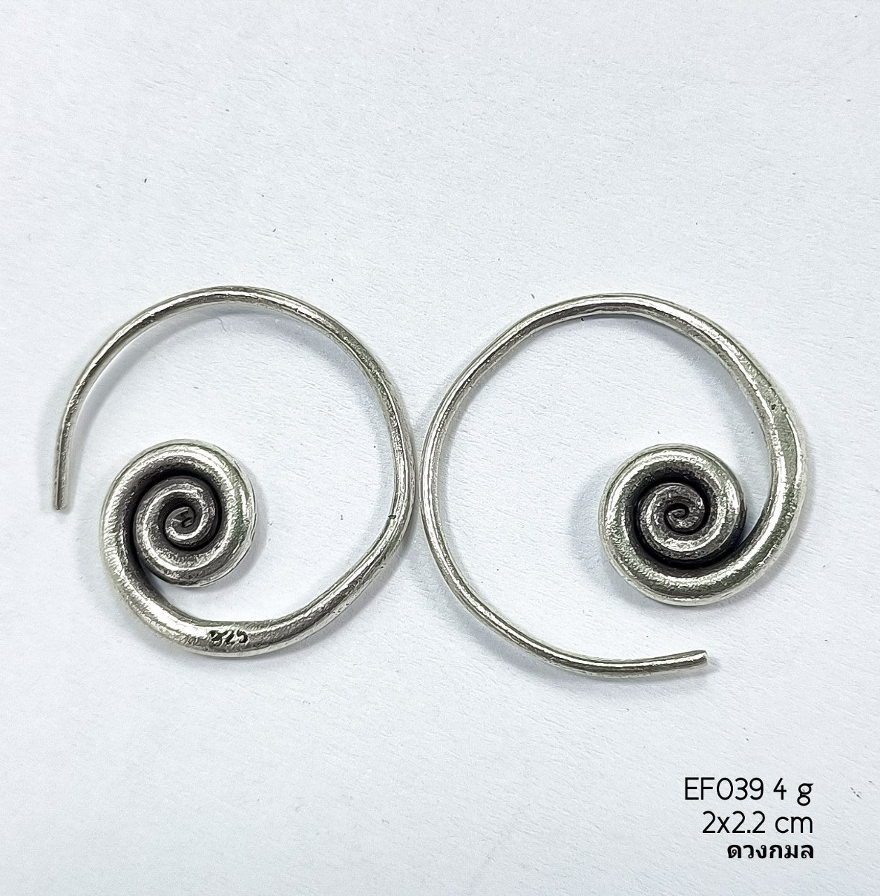 Mesmerizing spirals of shine. Essential silver earrings for any look.