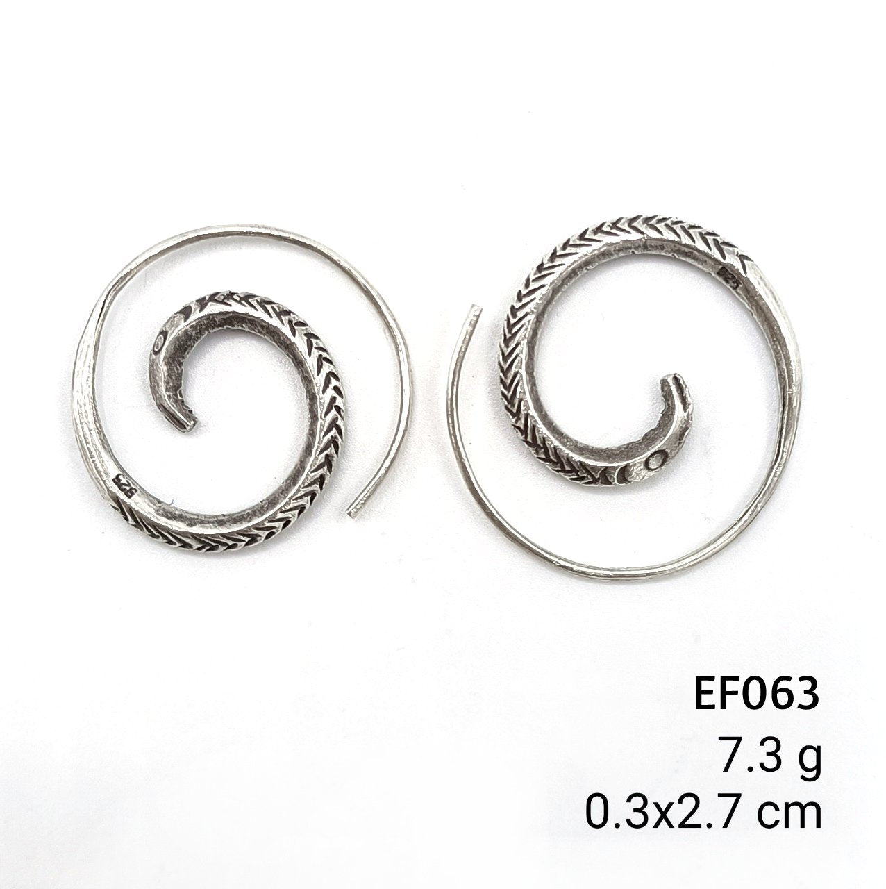 Infinite style in a simple twist. Love these spiral silver earrings.