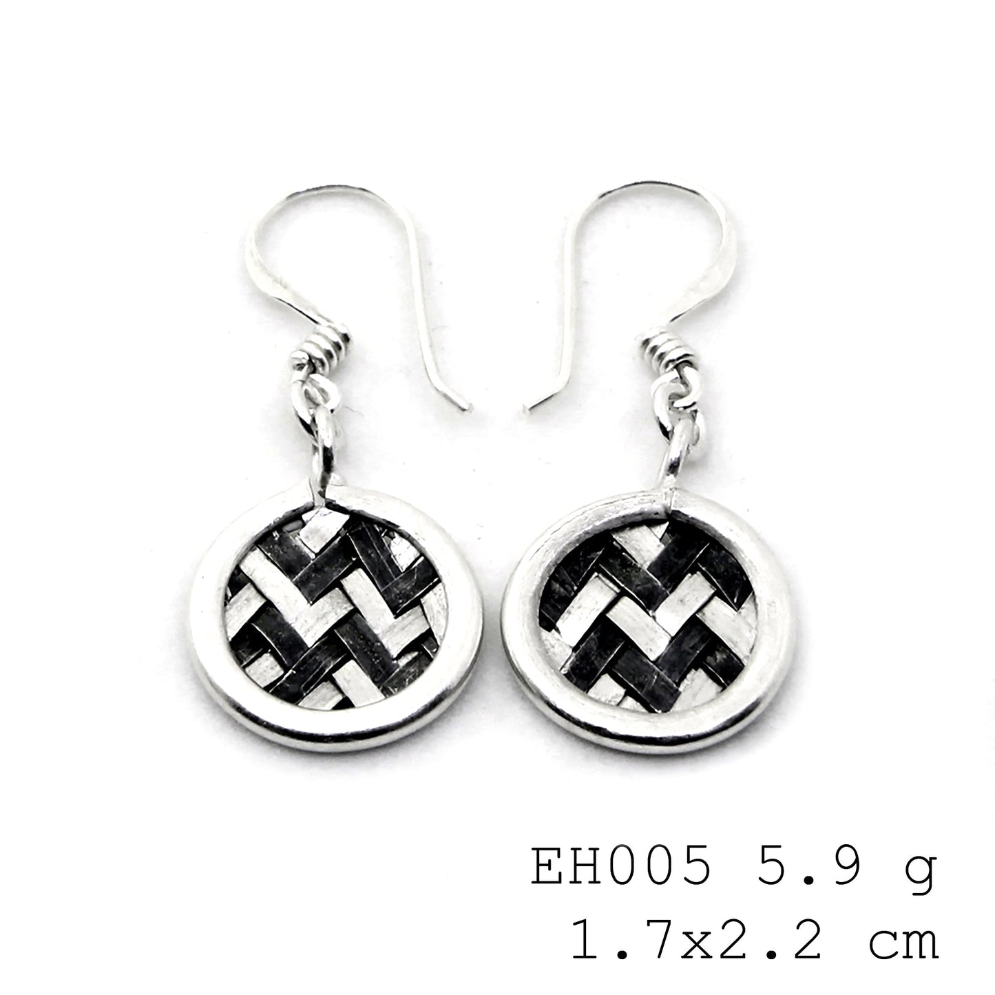 A classic twist on handmade silver earrings.