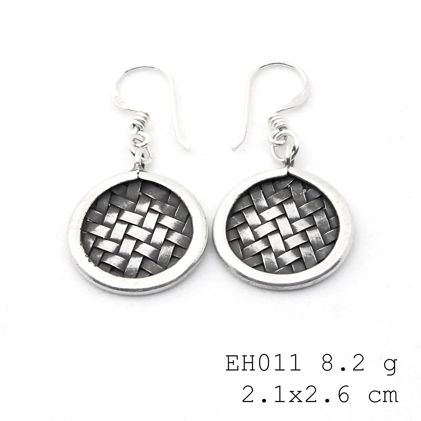 Hand-woven magic in these silver earrings.