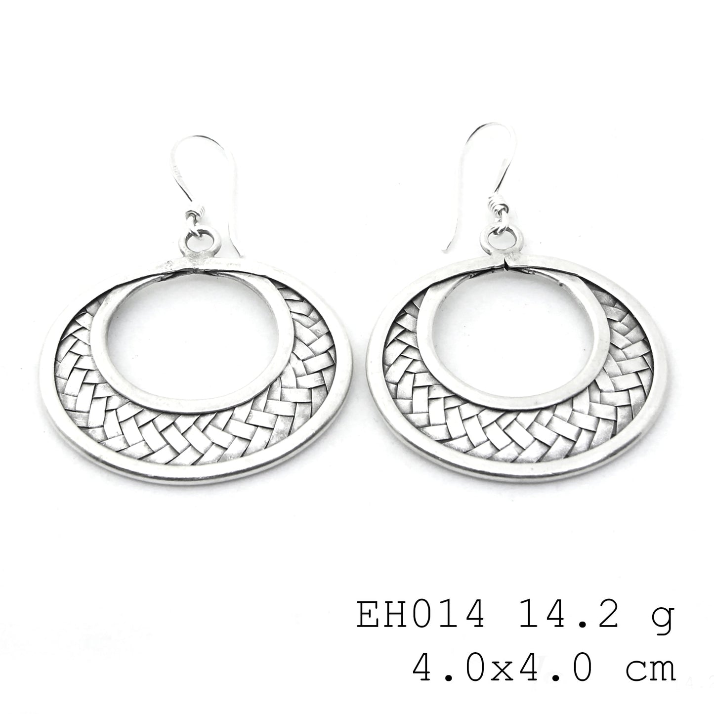 Purely refined: our woven silver earrings.
