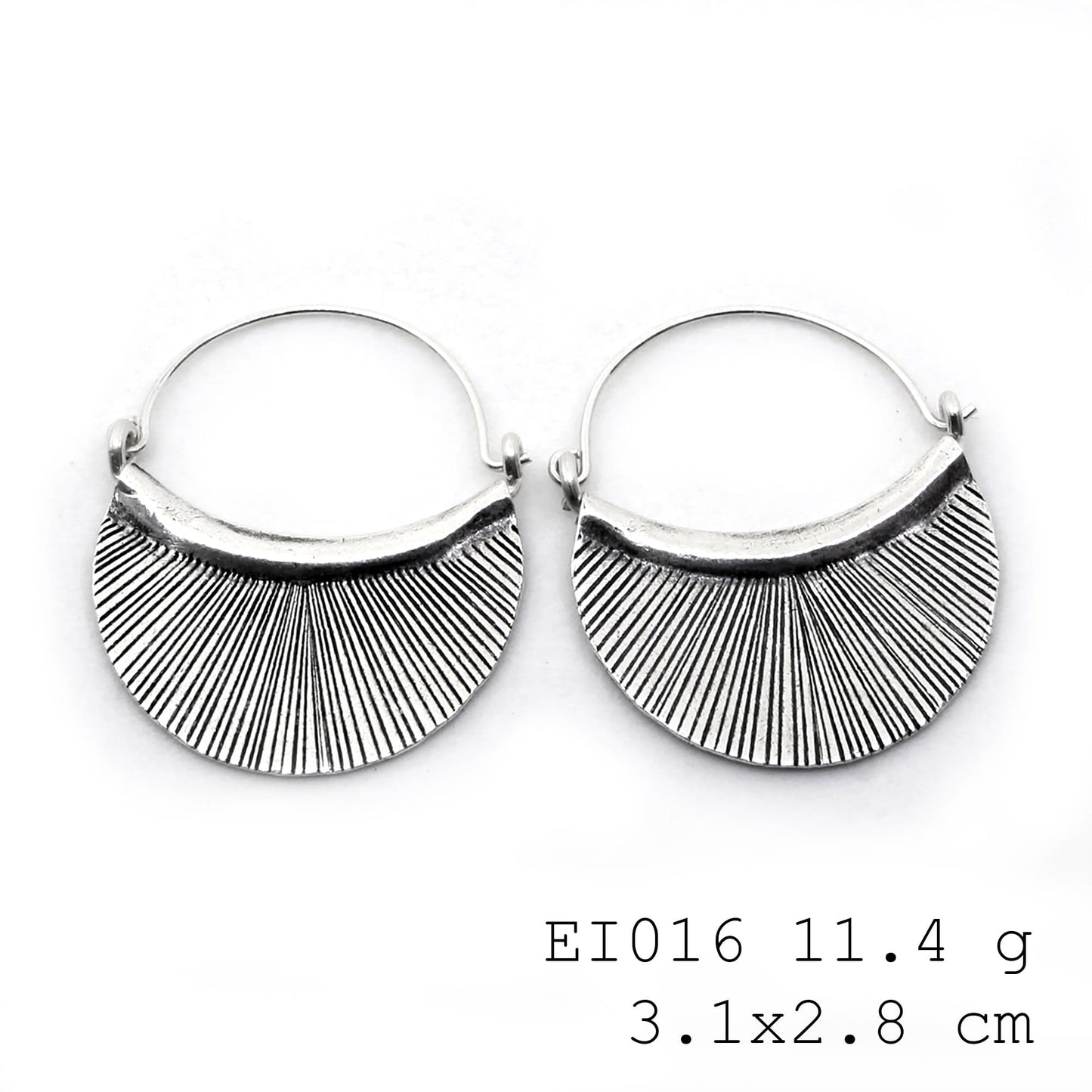 Purely charming bag-shape silver earrings.