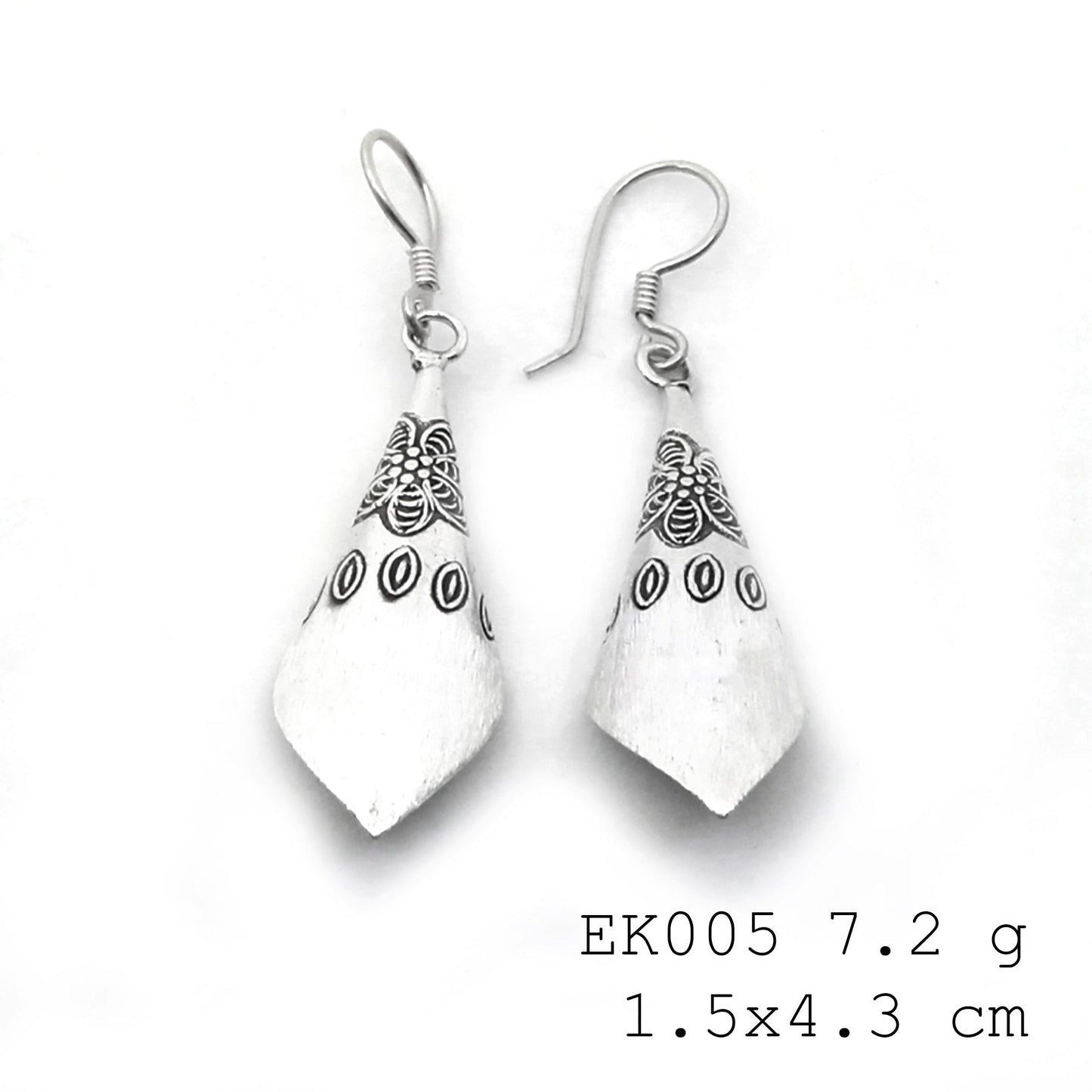 Hand-forged funnel designs in pure silver earrings.