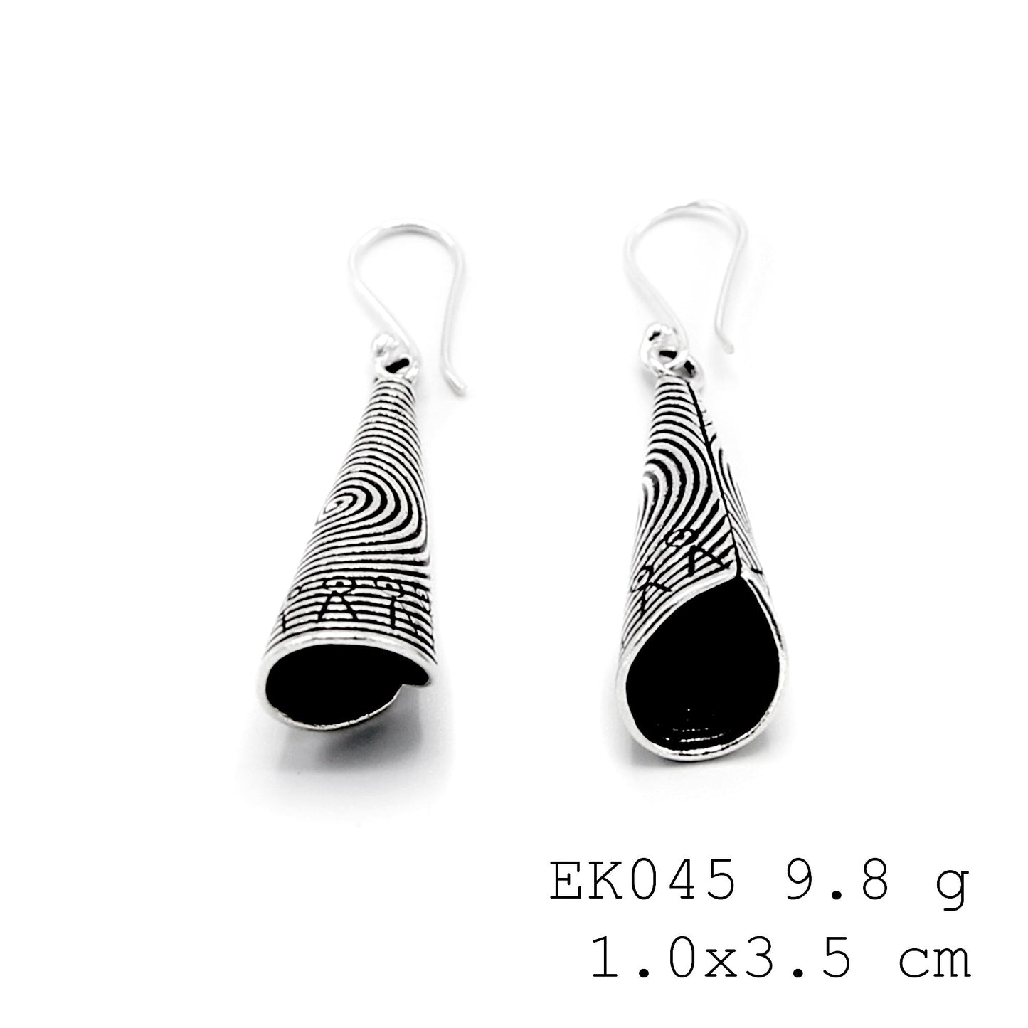 Artisan-crafted texture on these funnel silver earrings.