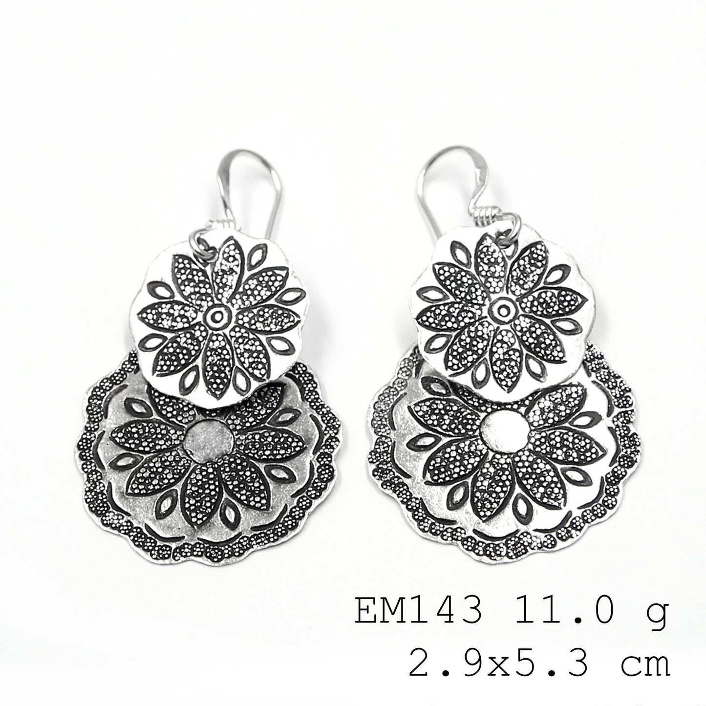 Shop the 98% purity collection: silver earrings.