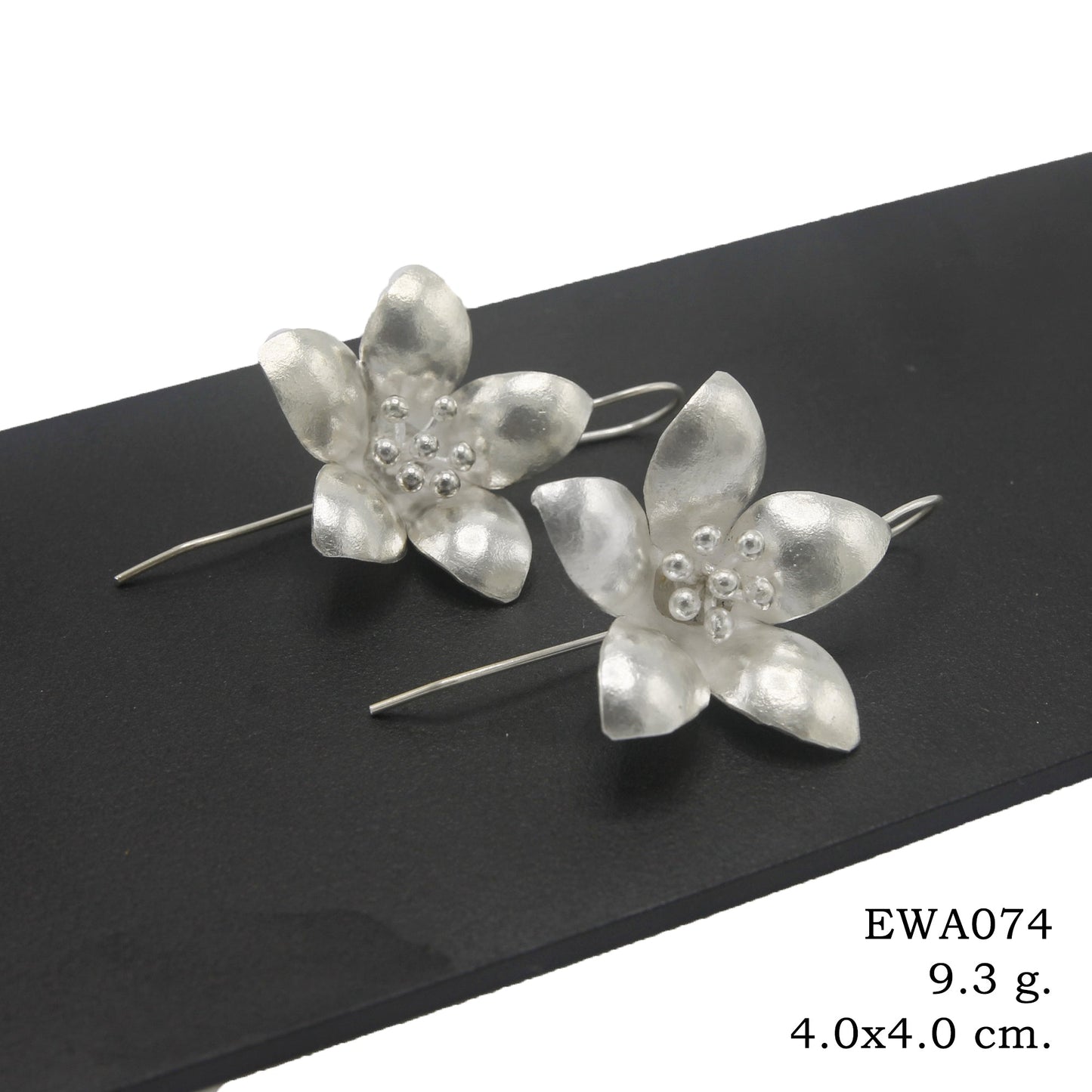 Soft petals, hard silver. Discover our unique silver earrings.