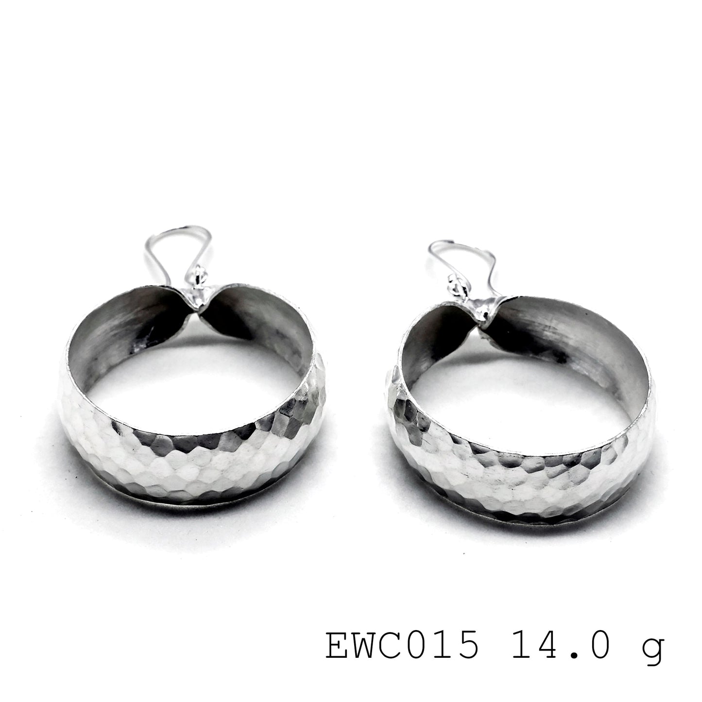 The "it" item of the season: Handmade bag shape silver earrings.