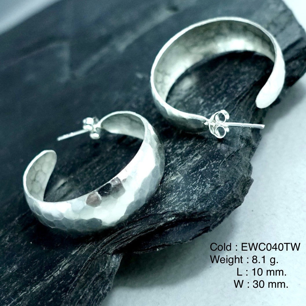 Elevate your jewelry game with these 98% pure bag silver earrings.