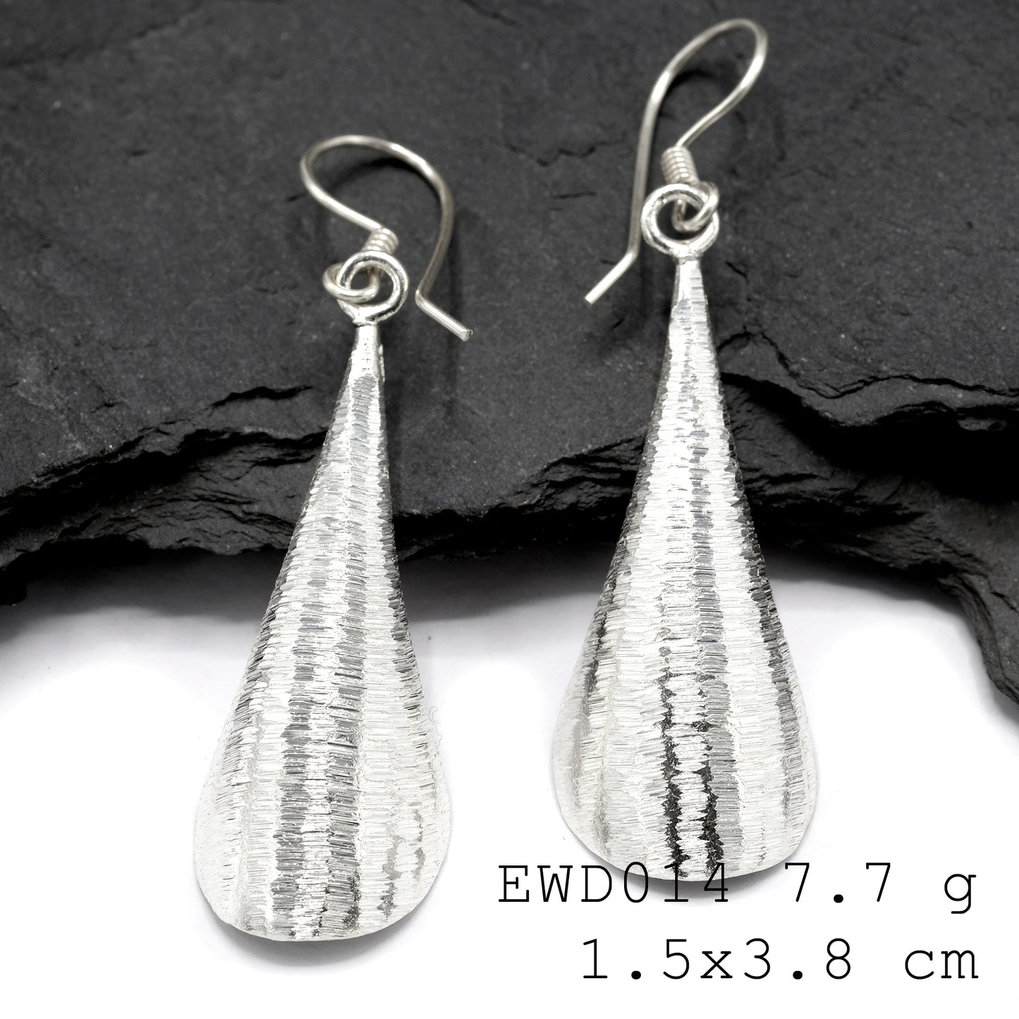 Stop scrolling and see these stunning white funnel silver earrings.