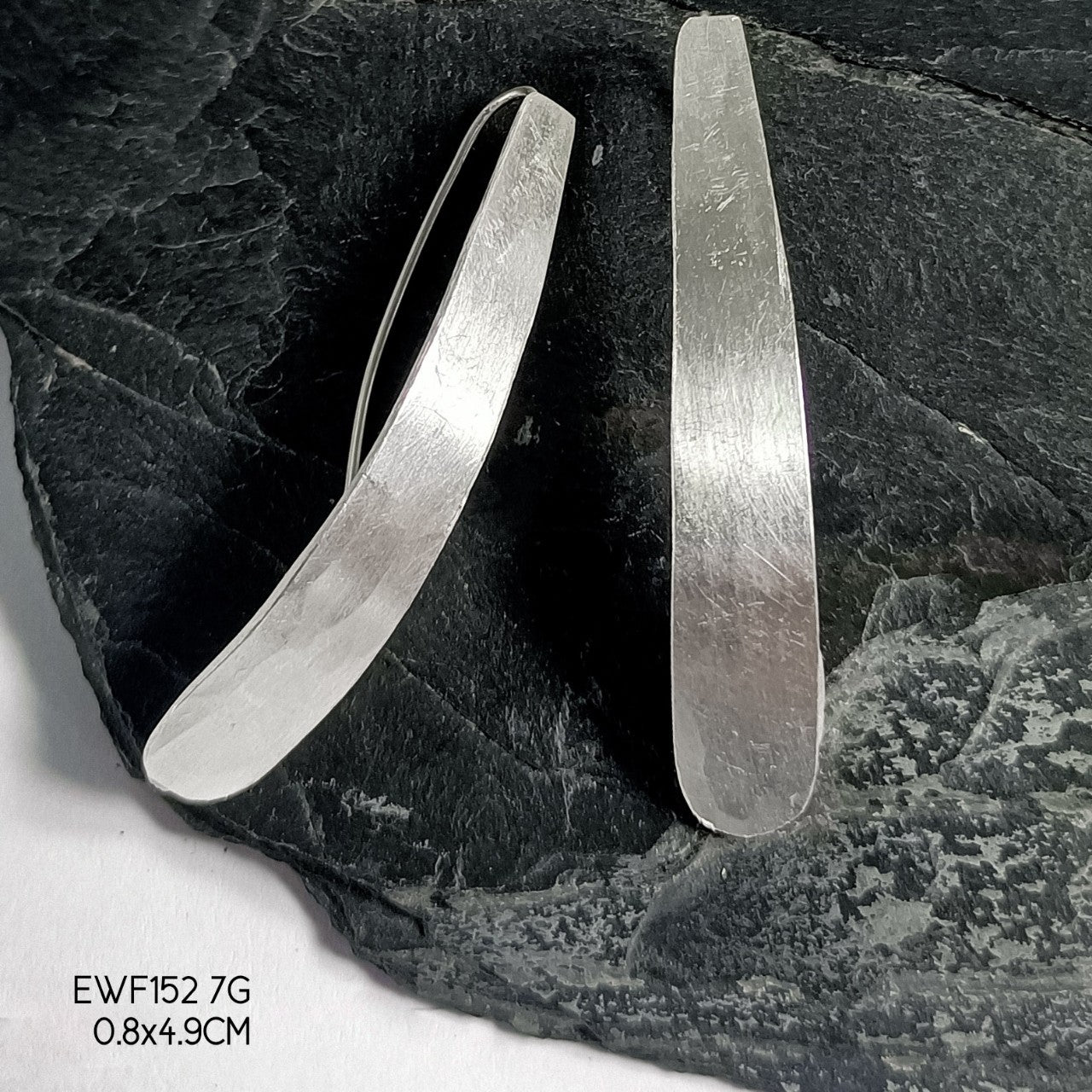 Hand-hammered 98% pure white sheet silver earrings.