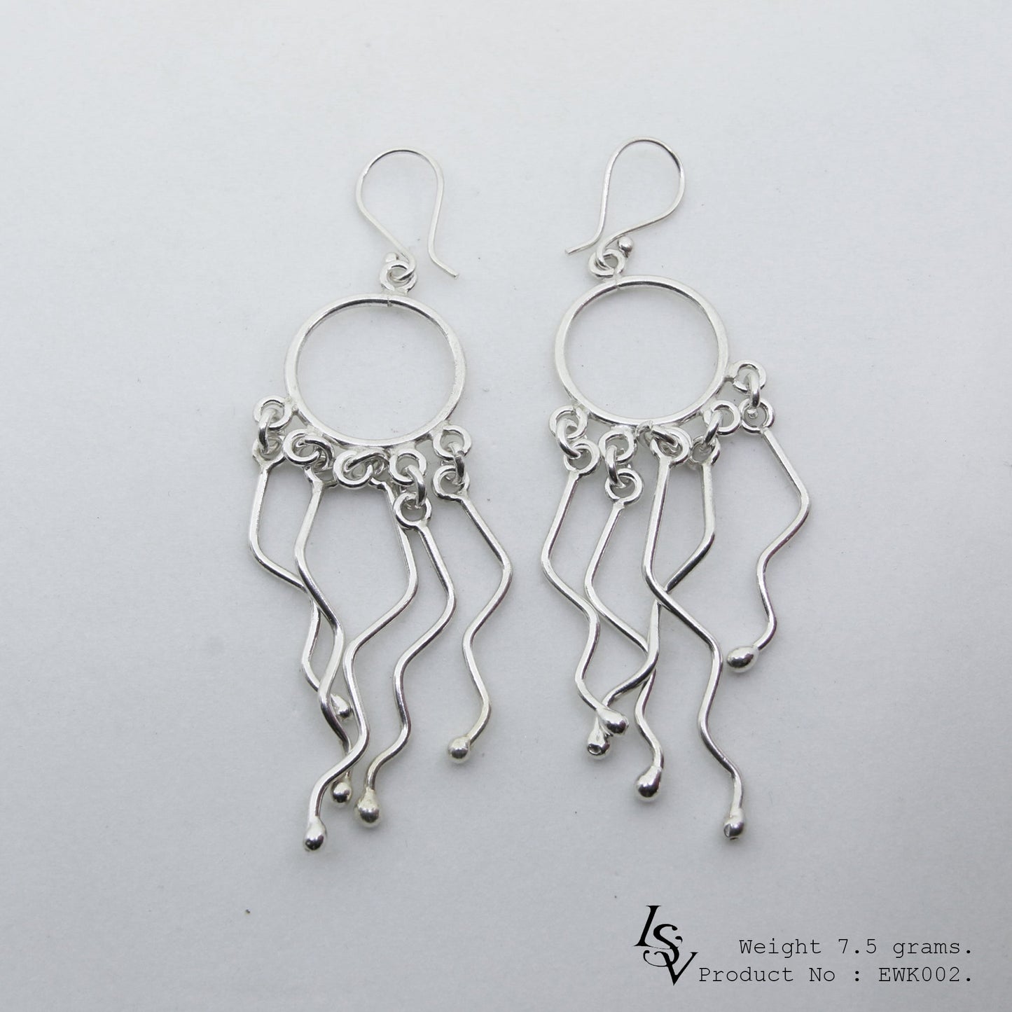 Artisan-made 98% pure silver: Shop white line silver earrings.