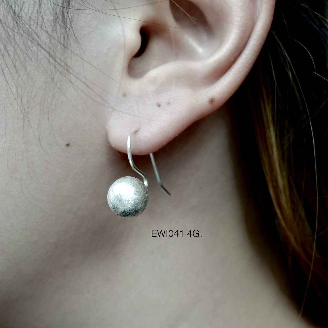 Minimal earrings, maximum grace.