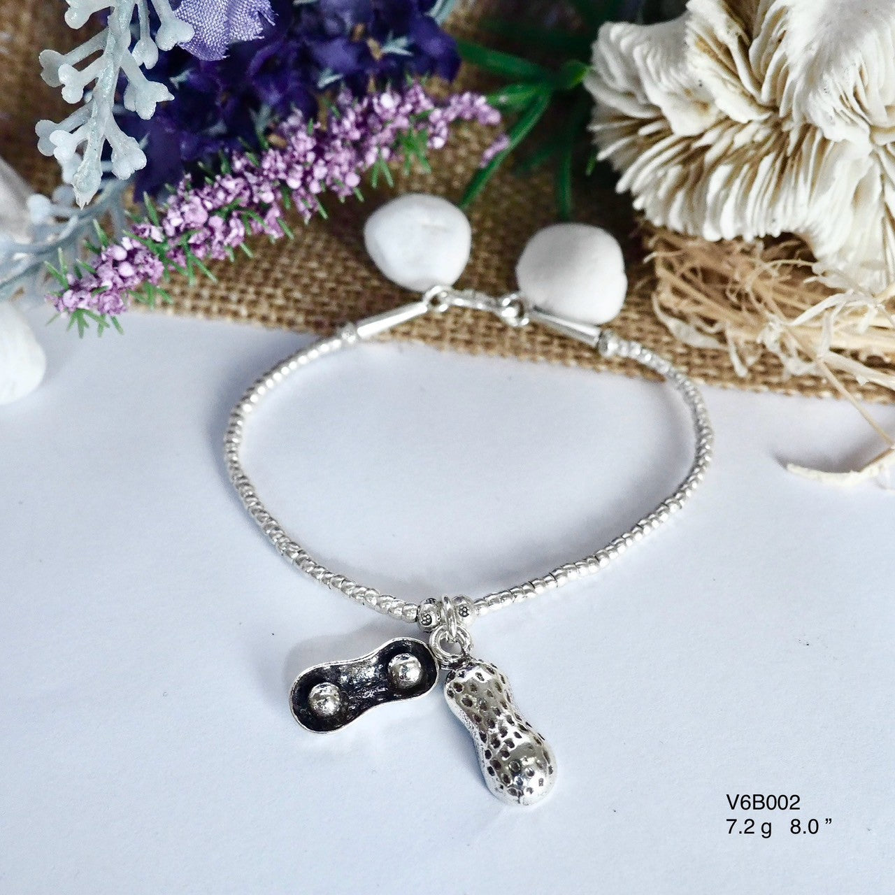 Grace in Silver: Classic Bracelet Design
