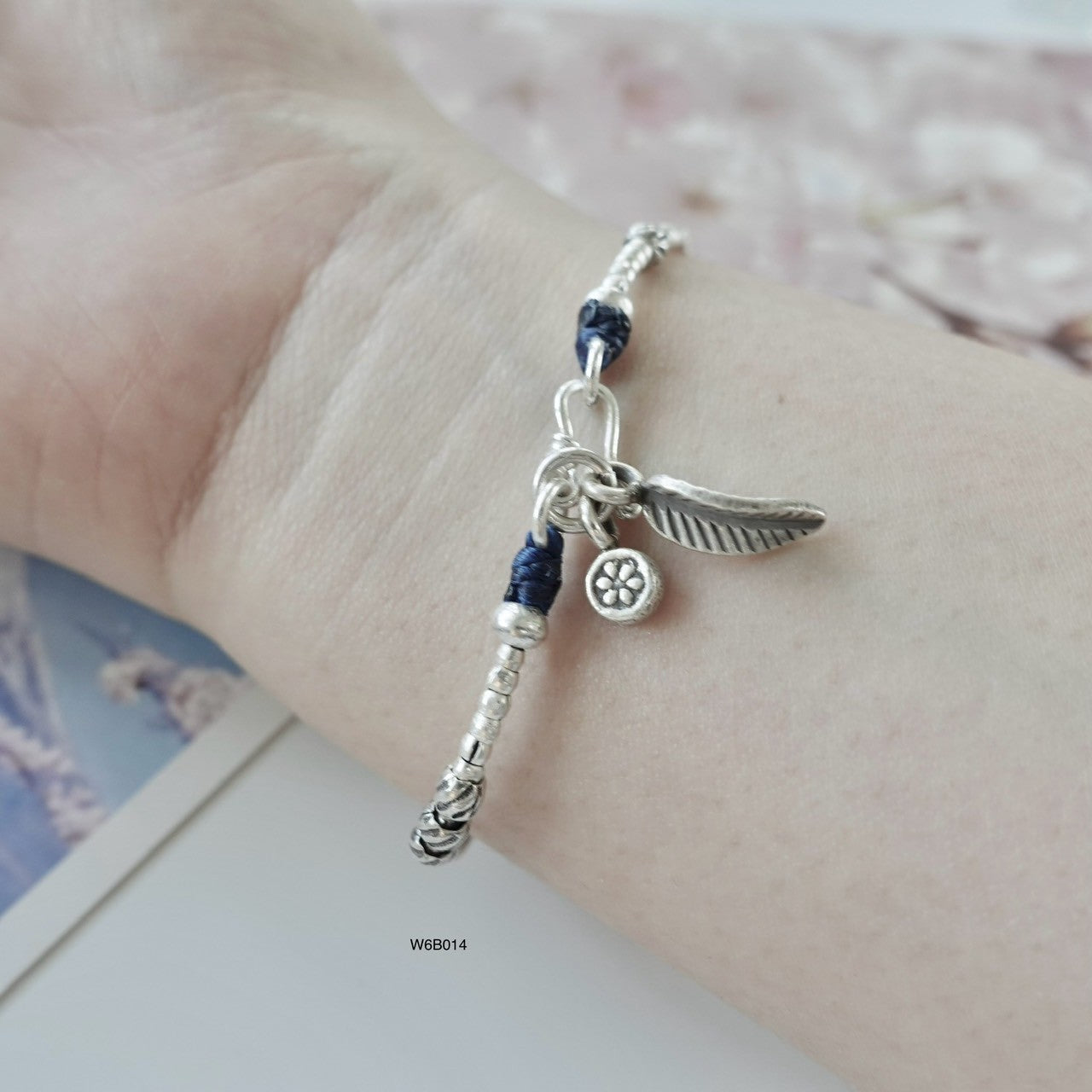 Grace your wrist with a silver bracelet, now on limited-time offer.