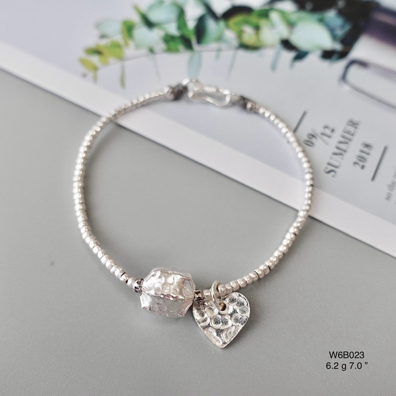 Who said luxury has to be pricey? Silver bracelet, now on sale.