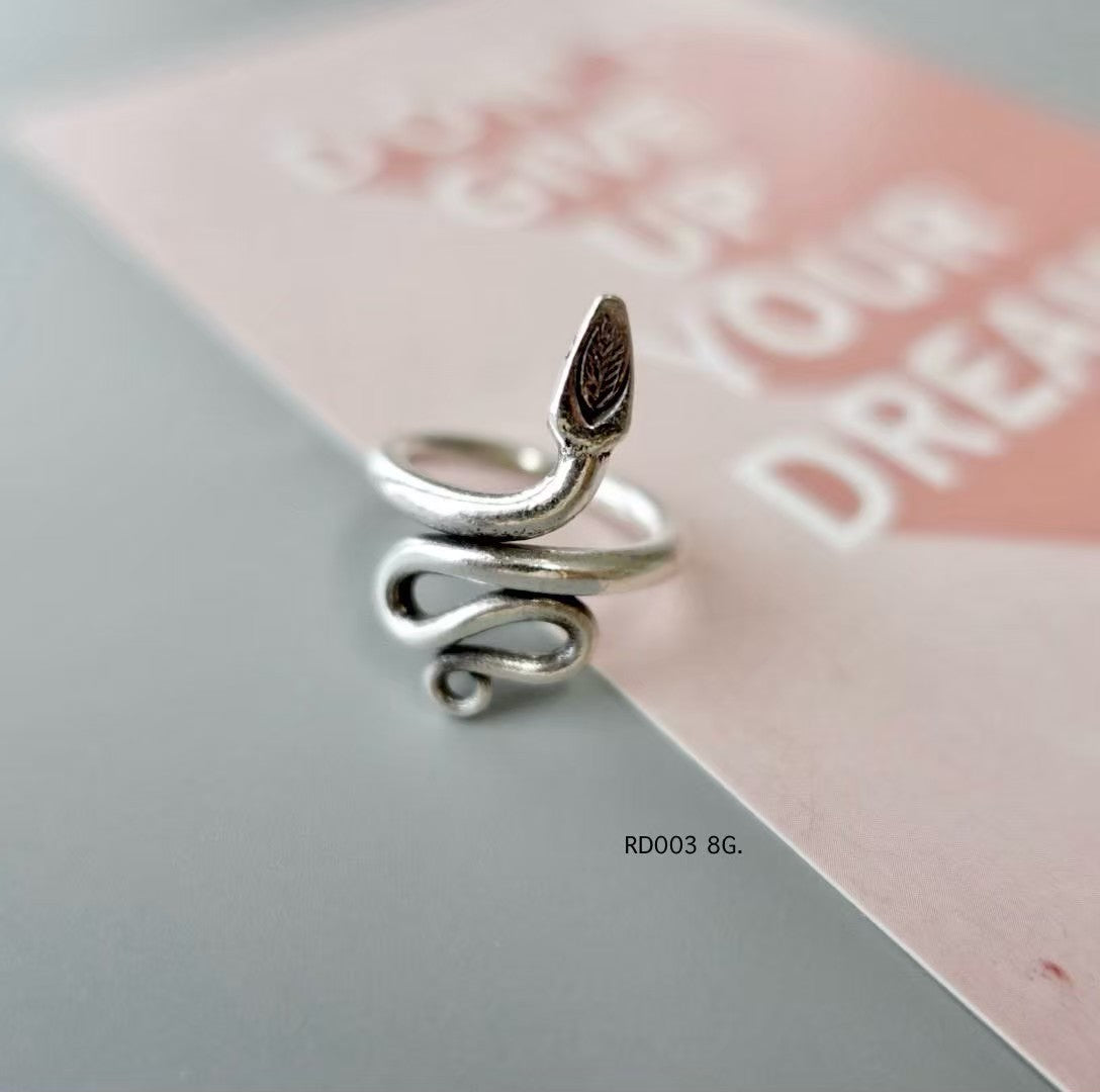 Echoes of tradition in pure silver ring.