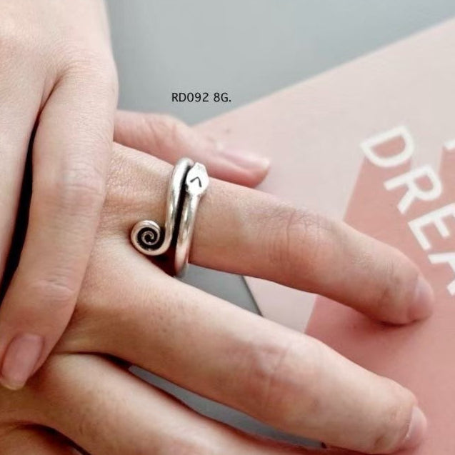 Silver ring. Traditional charm, modern edge.