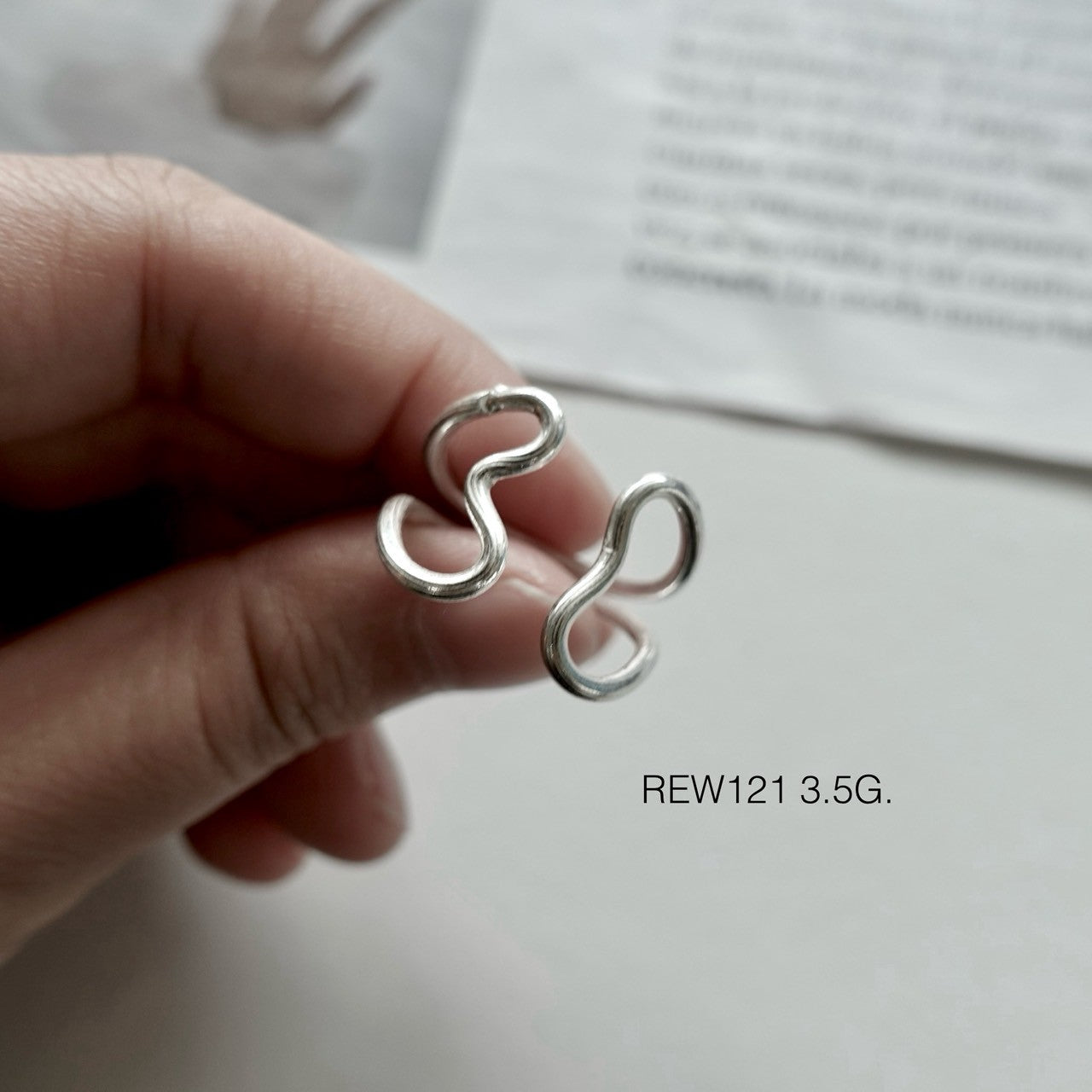 Uniquely yours with silver ring.