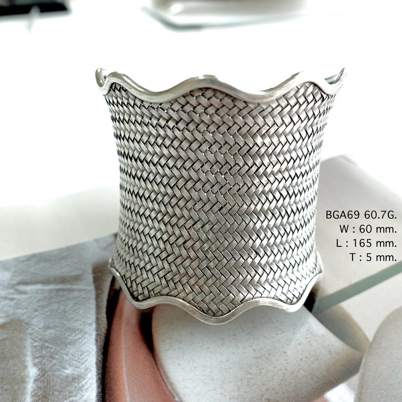 Wrap your wrist in a silver bangle.