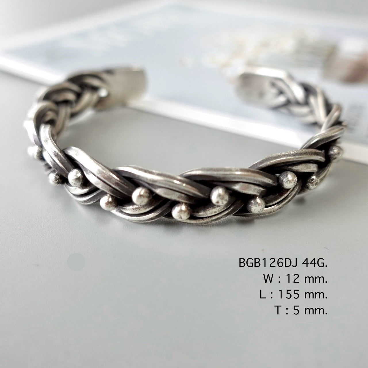 Pure silver, pure bangle beauty.