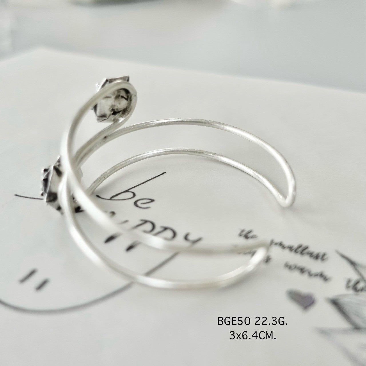 Silver bangle. Wear a story, not just a bangle.