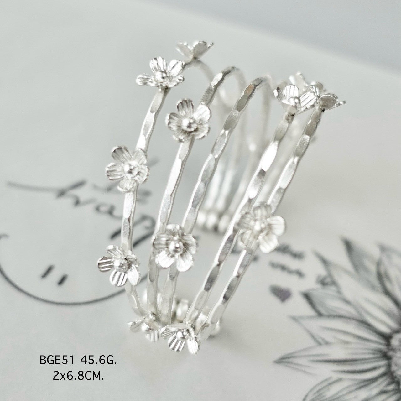 Silver bangle. Silver that speaks tradition.