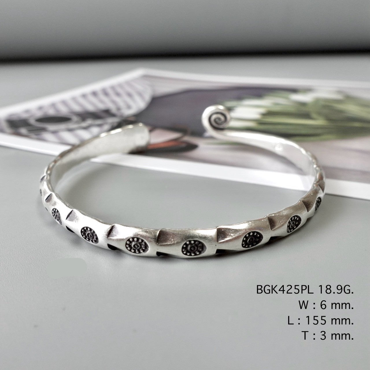 This bangle is all heart and silver.