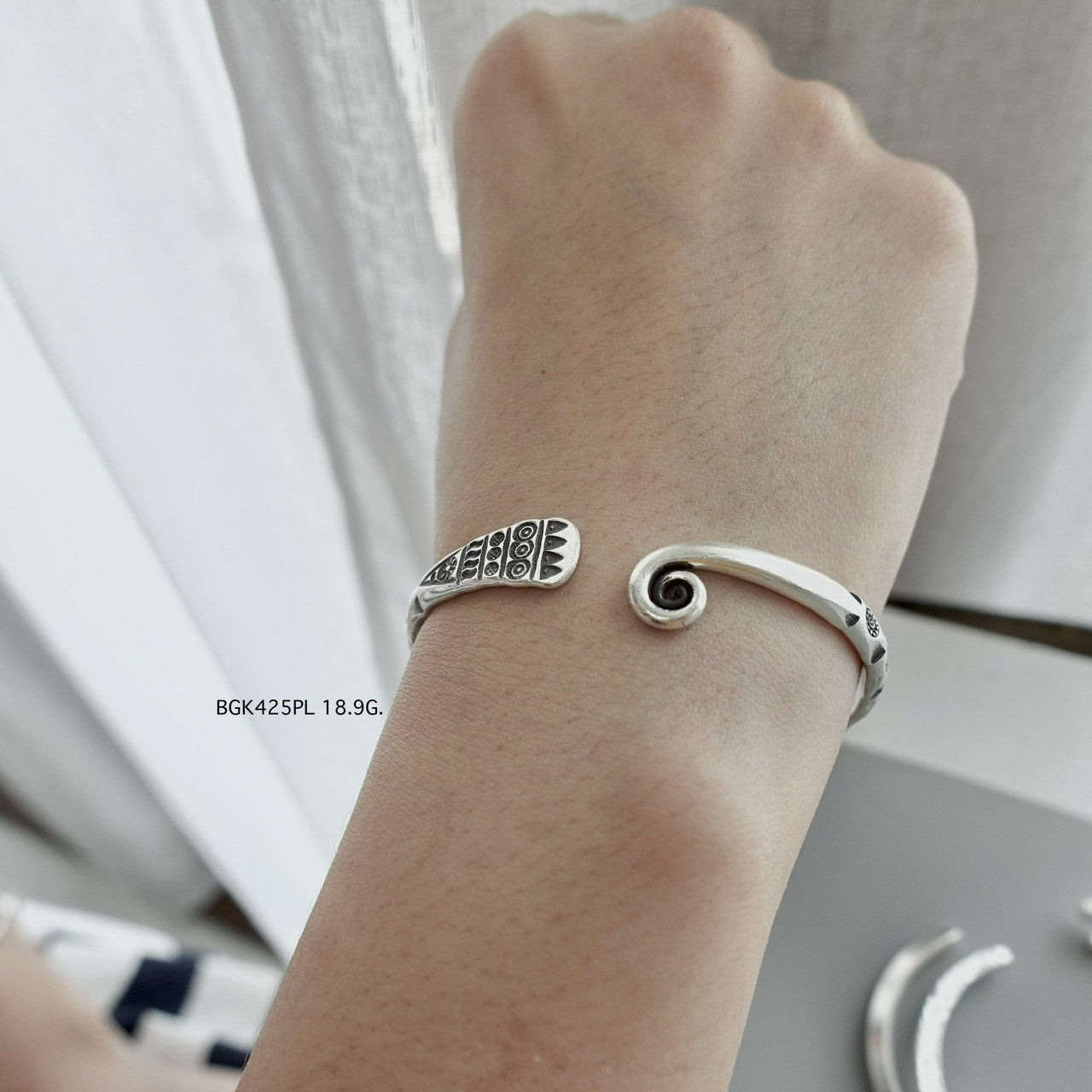 This bangle is all heart and silver.