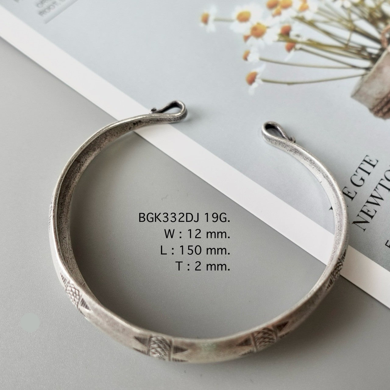 Make space for one more silver bangle.