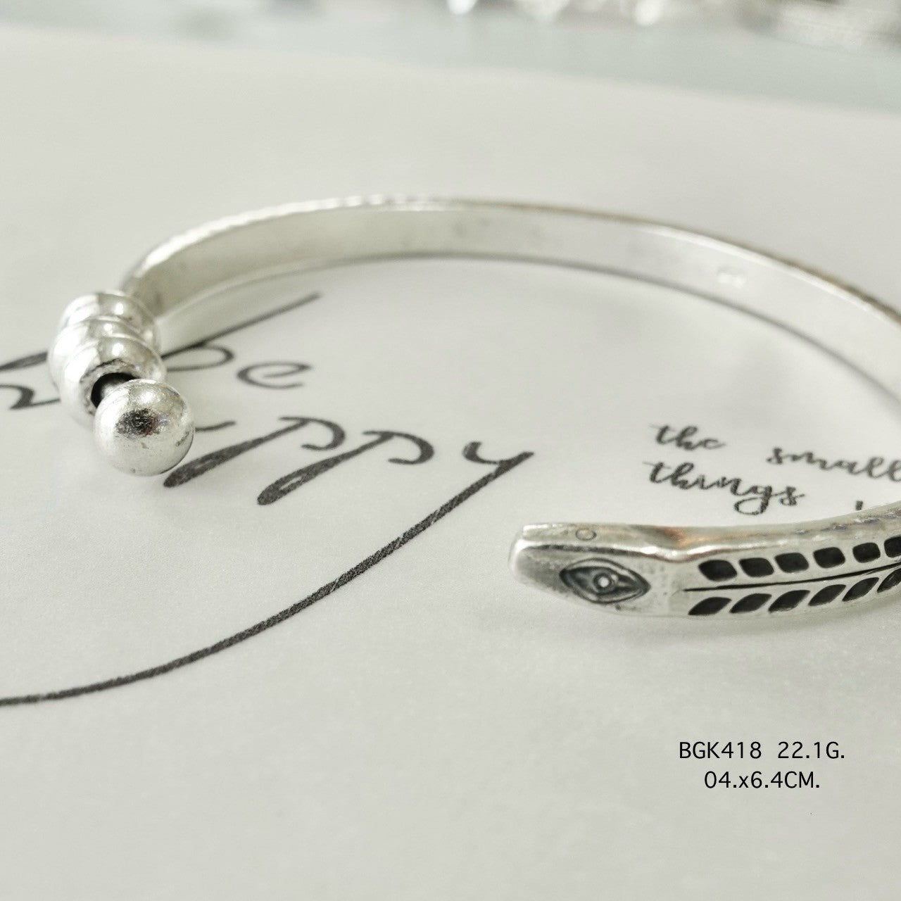 Silver bangle. Luxury, rooted in tradition.