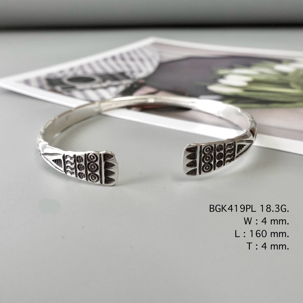 Your silver bangle, made with care.