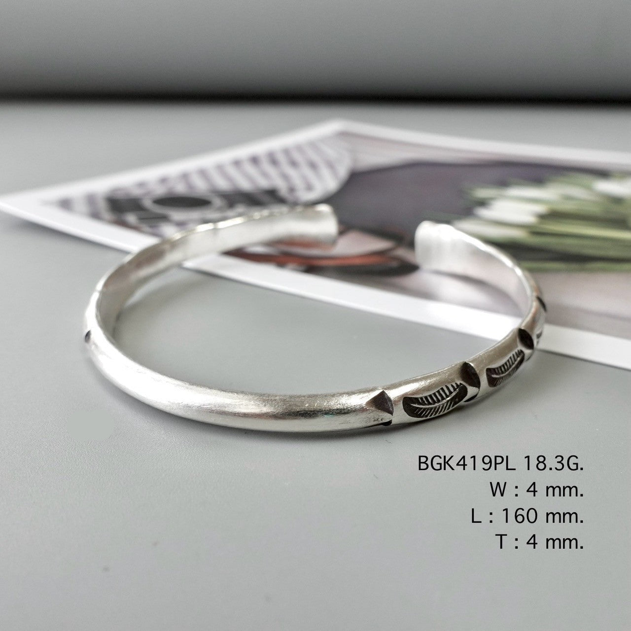 Your silver bangle, made with care.