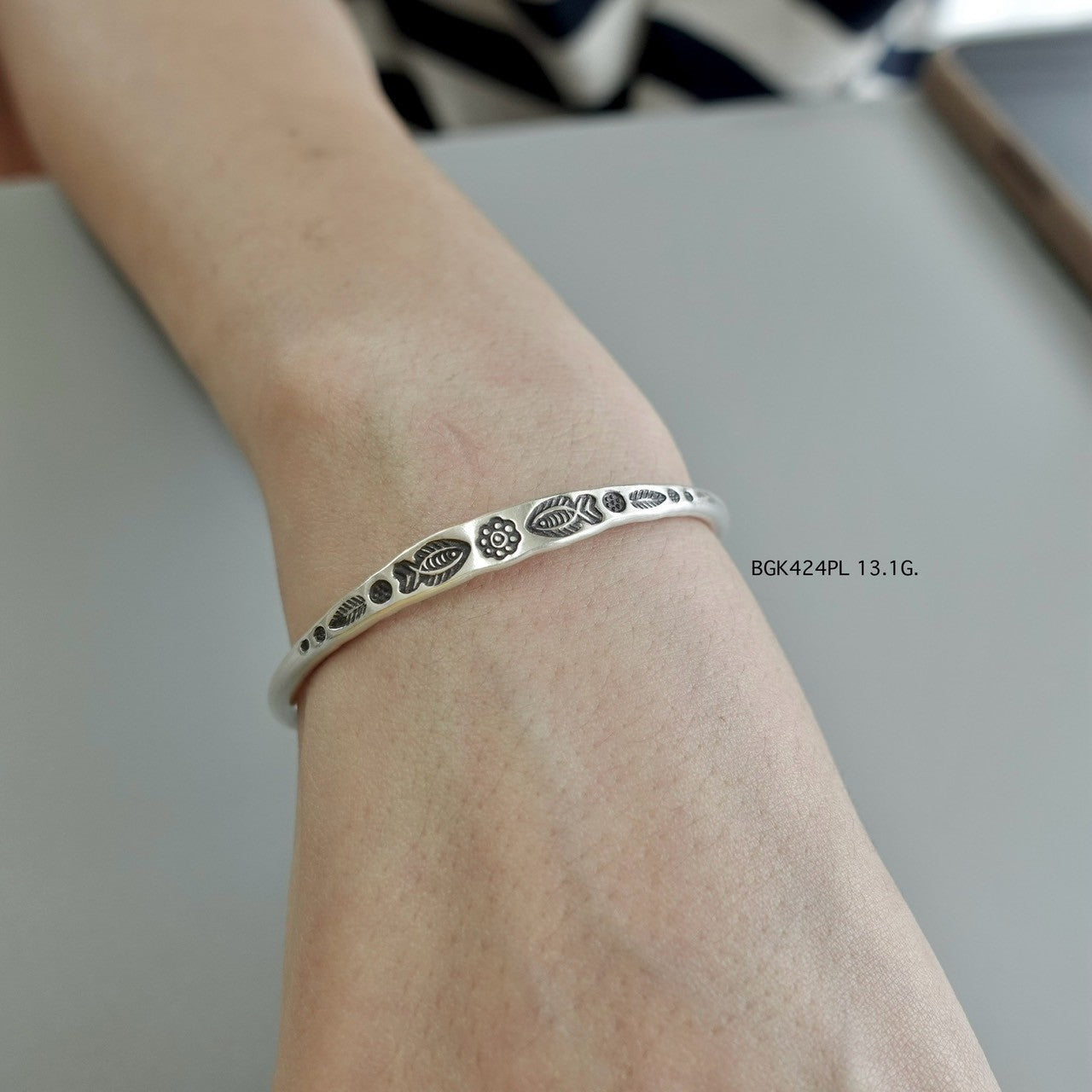 Nothing basic about this silver bangle.