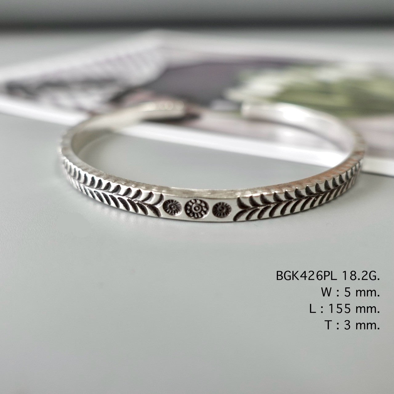 Start your stack with a handmade bangle.