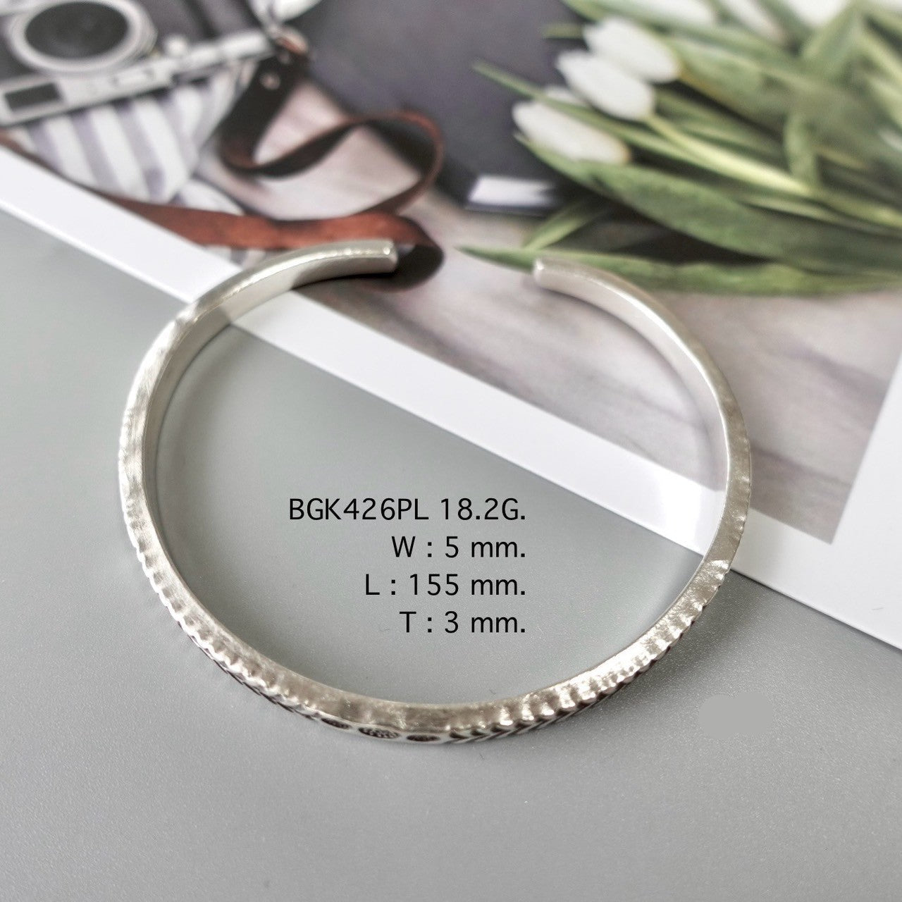 Start your stack with a handmade bangle.