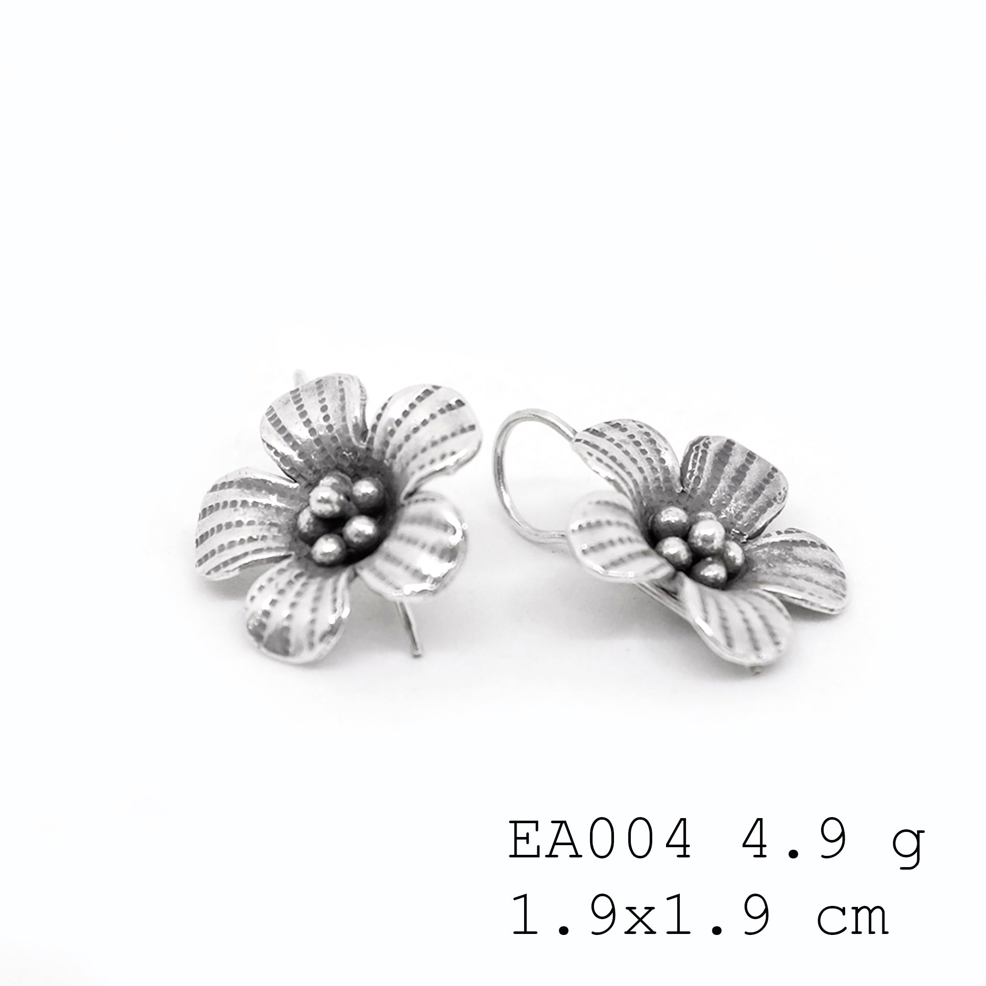 The sweetest handmade silver earrings.