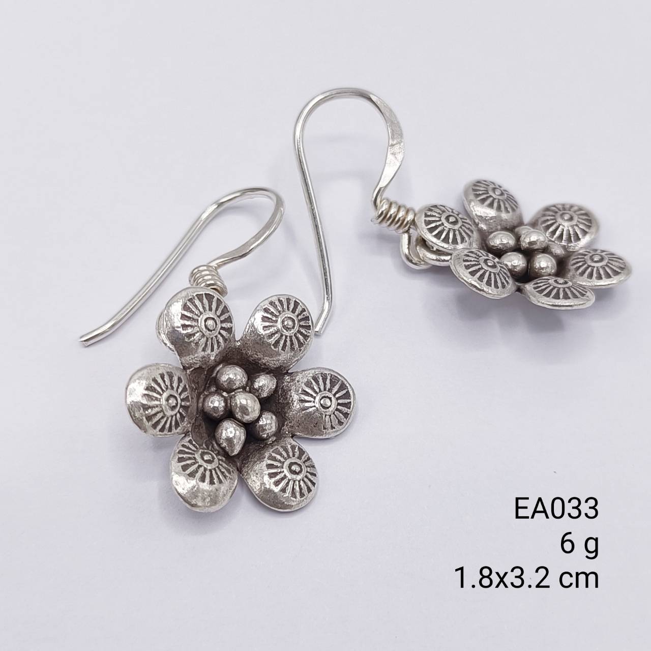 Uniquely yours. Each pair is different. Flower earrings.