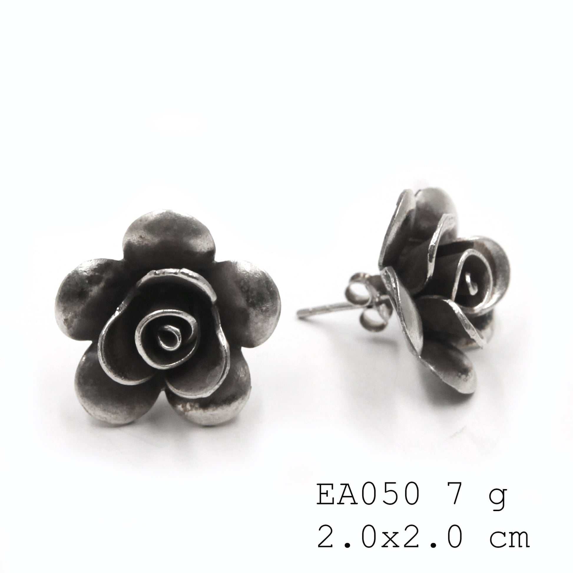 Crafted, not mass-produced. Flower earrings.