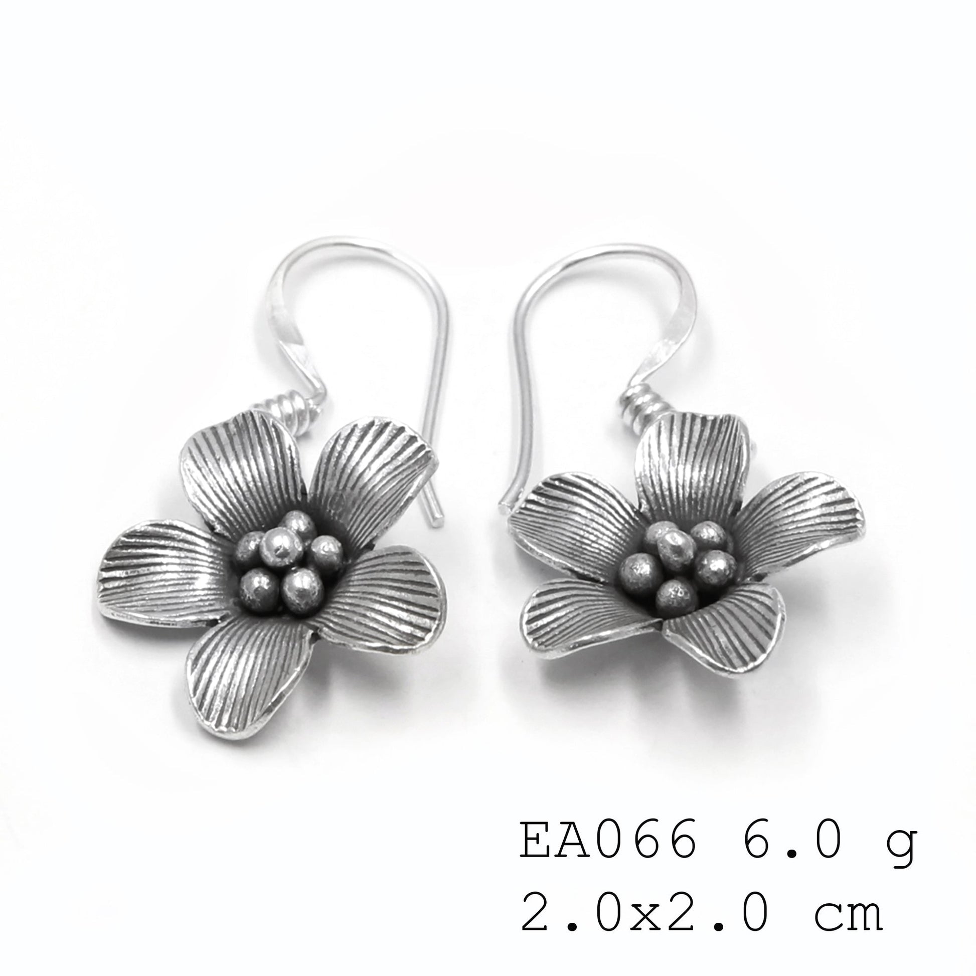 Your daily dose of sparkle. Flower earrings.