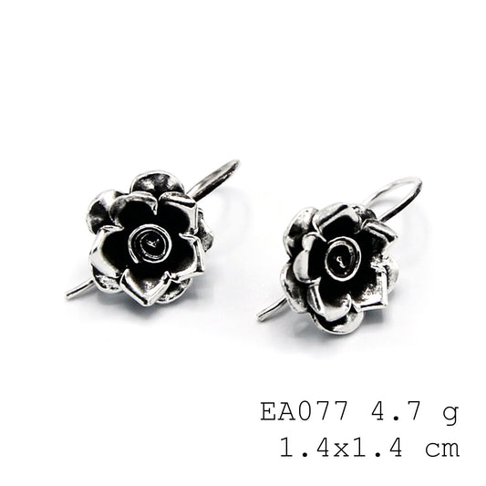 Proof that beautiful things are handmade. Flower earrings.