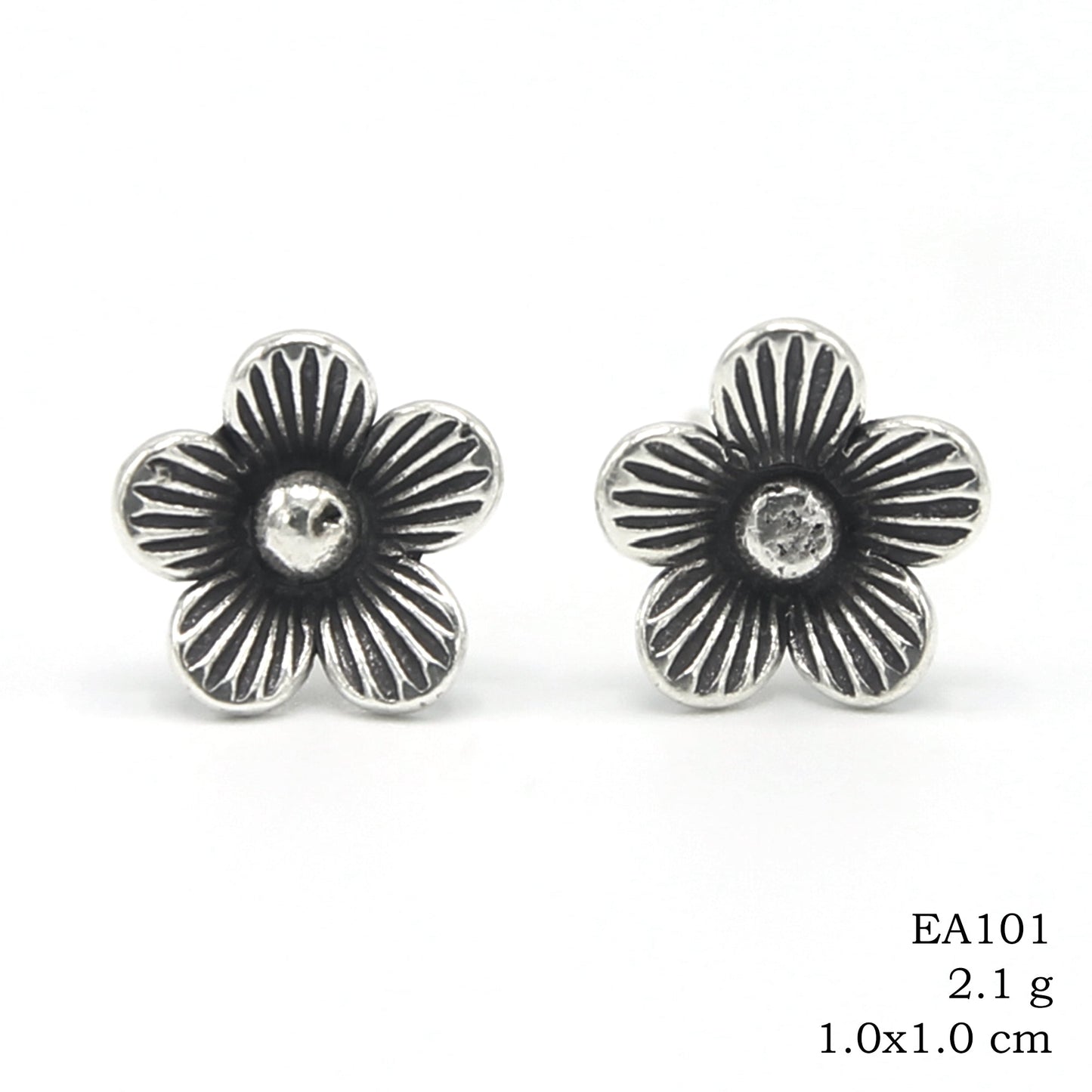 Art you can wear. Handmade silver earrings.