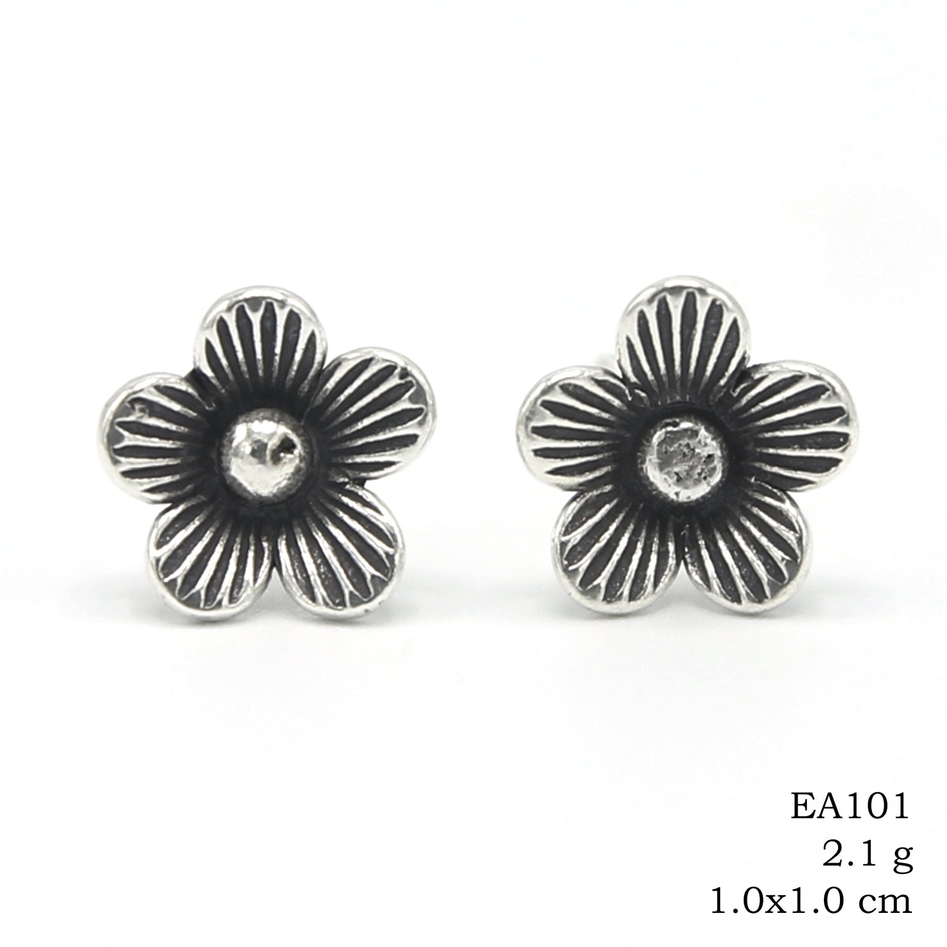 Art you can wear. Handmade silver earrings.