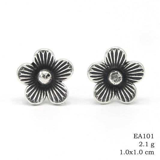 Art you can wear. Handmade silver earrings.