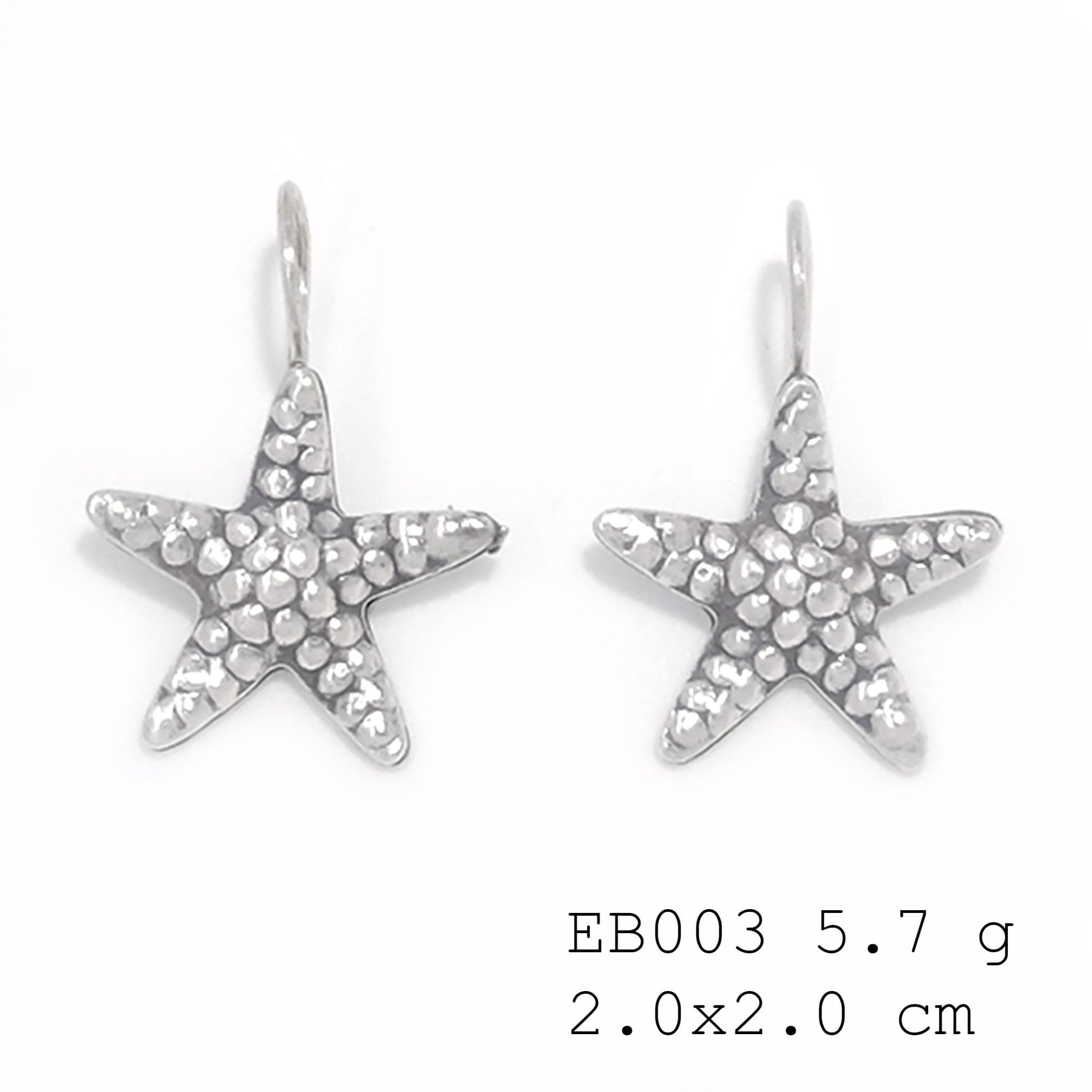 Intricate animal designs in shining silver. Star fish earrings.