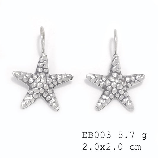 Intricate animal designs in shining silver. Star fish earrings.