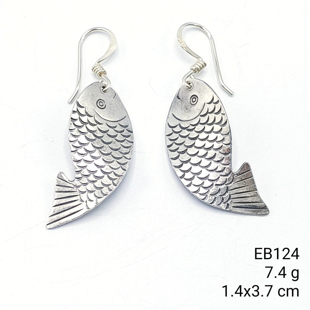 From sketch to sparkle. Animal earrings.