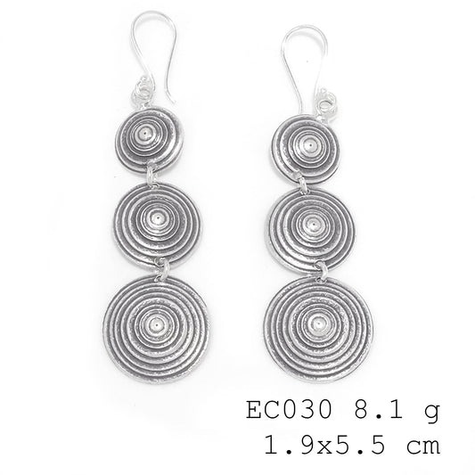 Handmade charm, captured in silver. Silver earrings.