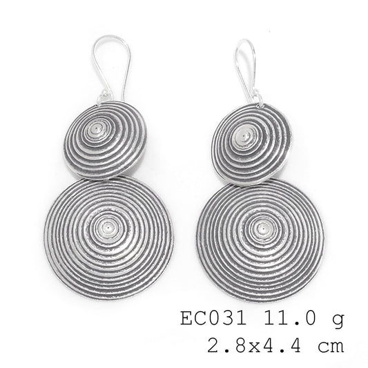 Imperfectly perfect, handmade silver earrings.