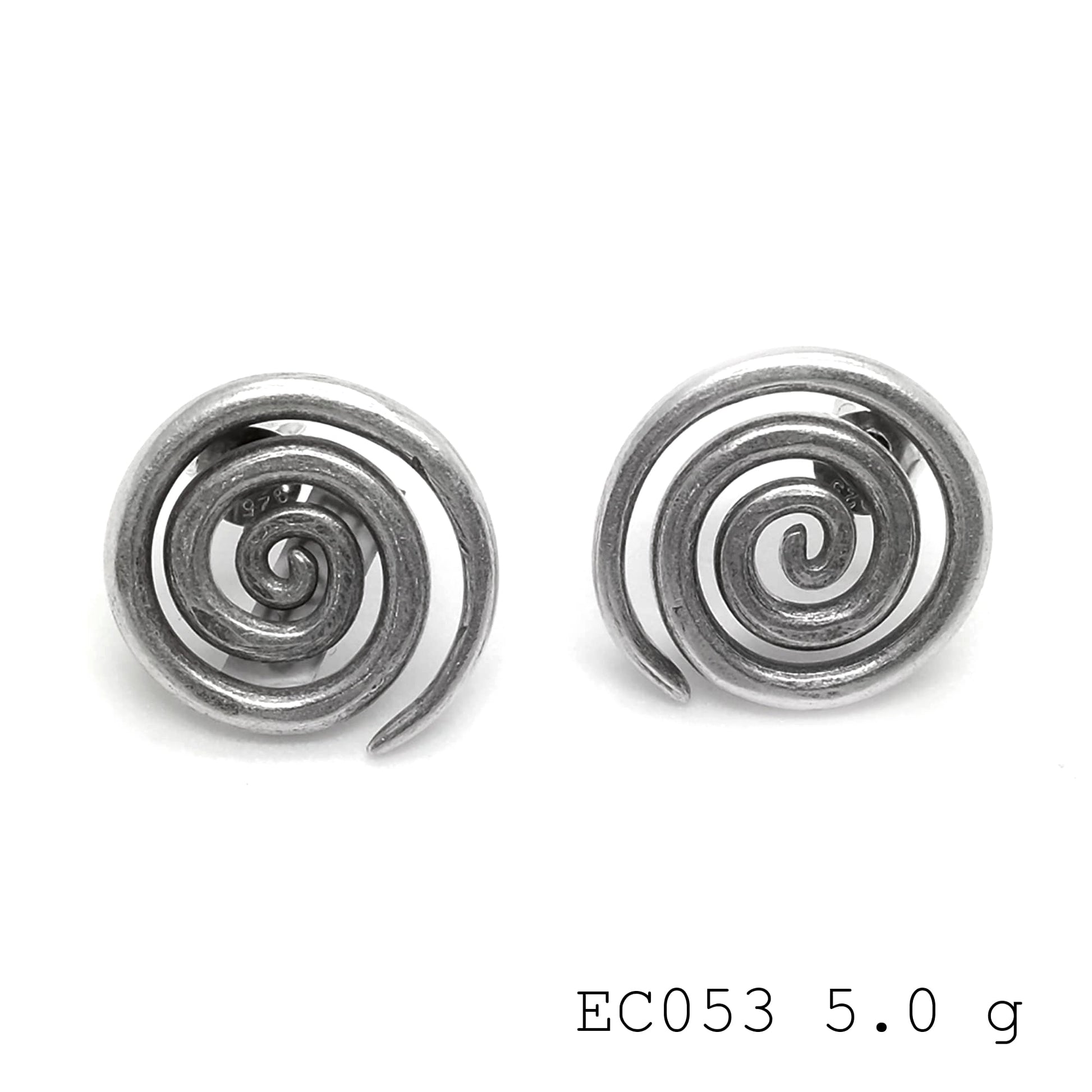 Supporting handmade craftsmanship. Silver earrings.